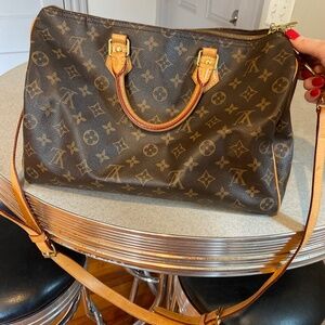 Used Louise Vuitton